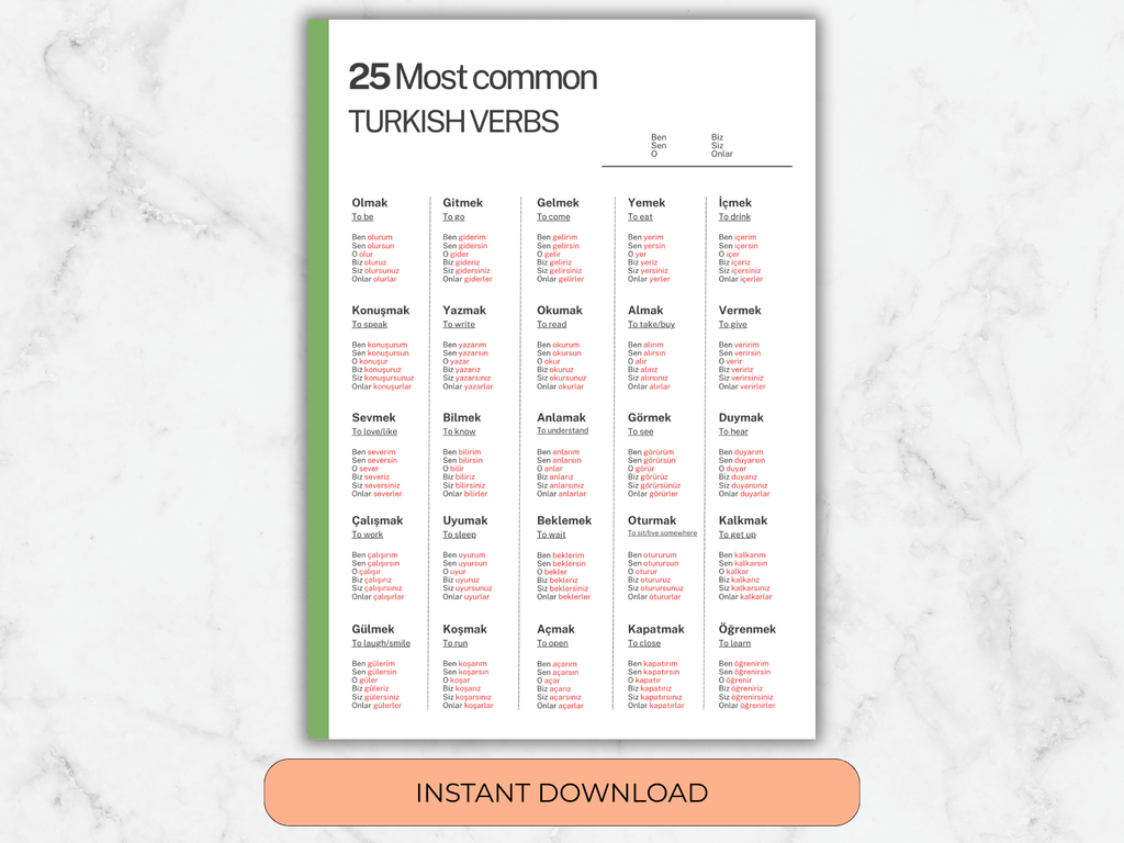 Sheet of paper with Turkish verbs on a marble background