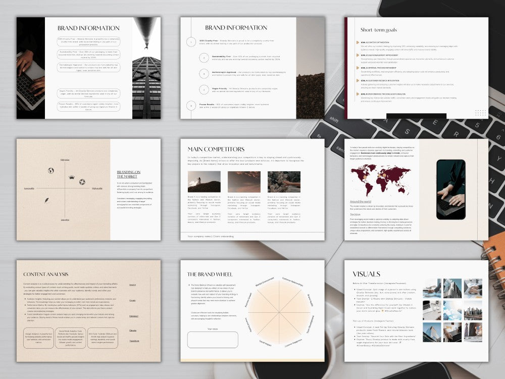Collection of branded information sheets on a desk with a laptop.