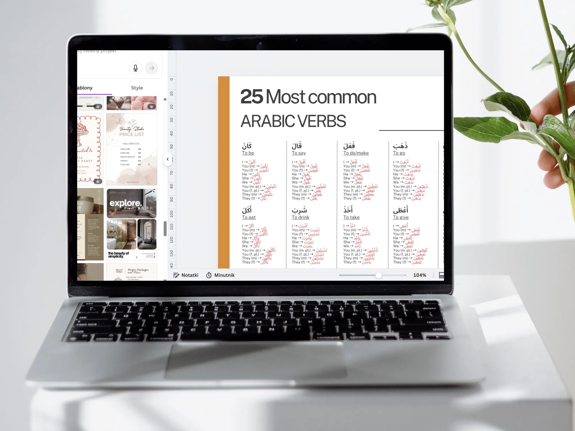 Laptop displaying a document titled '25 Most common ARABIC VERBS' on a white surface with a plant.