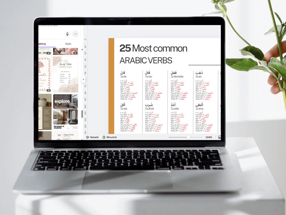 Laptop displaying a document titled '25 Most common ARABIC VERBS' on a white surface with a plant.
