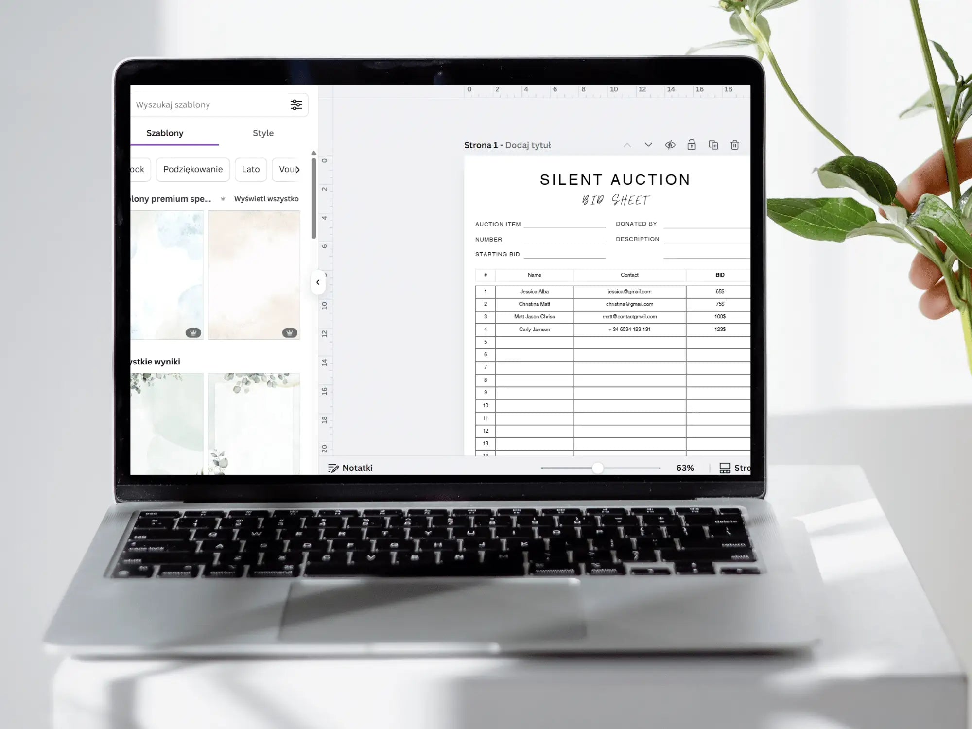 Laptop displaying a travel packing list on a white surface with a plant.