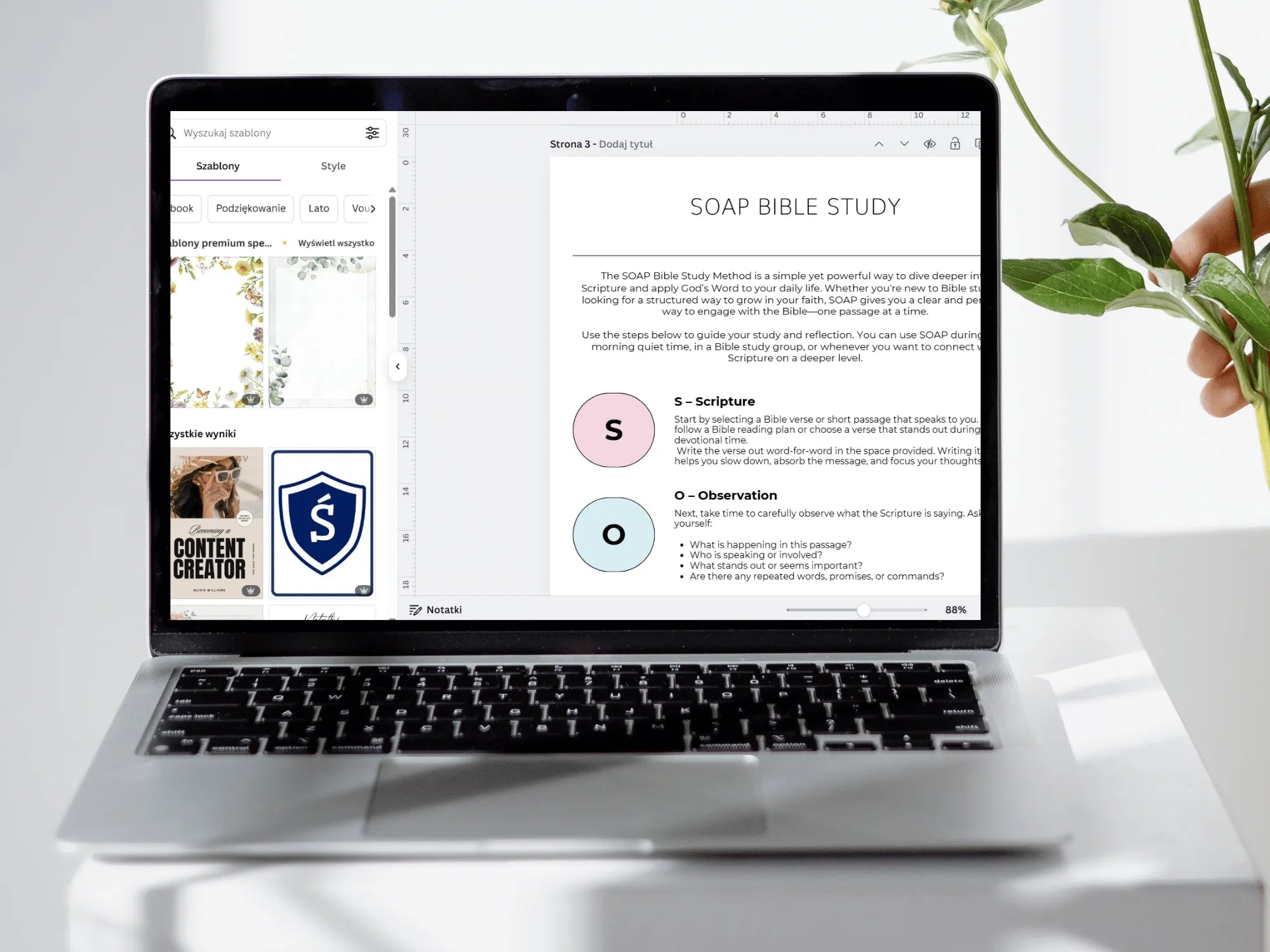 Laptop displaying a SOAP Bible Study interface on a white surface with a plant.
