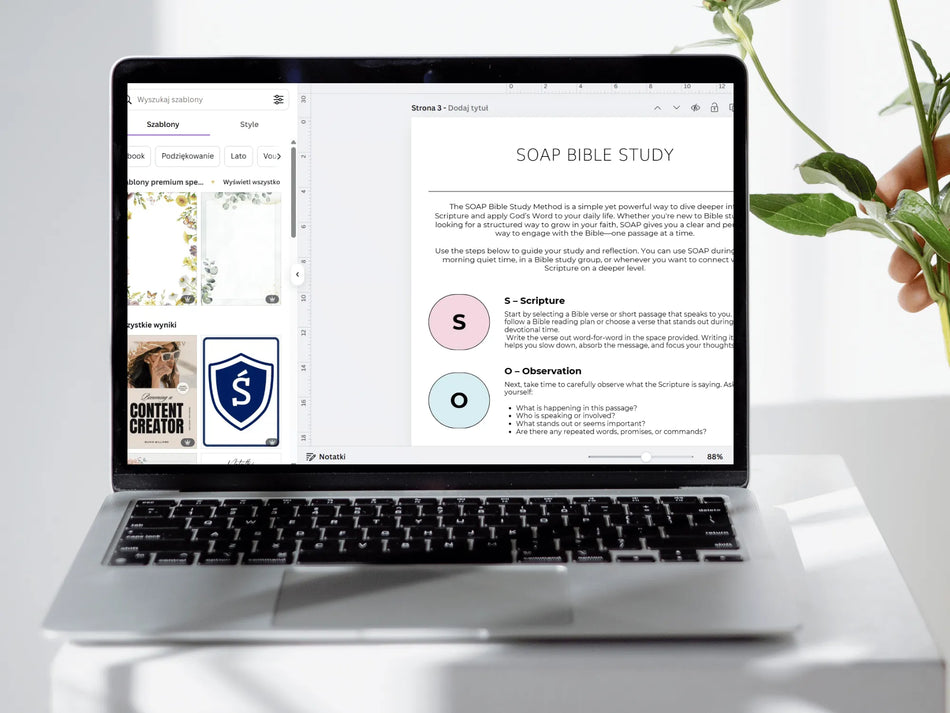 Laptop displaying a SOAP Bible Study interface on a white surface with a plant.