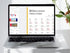 Laptop displaying a French verbs list on a white surface with a plant.