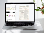 Laptop displaying a social media audit tool on a white surface with a plant.