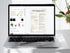 Laptop displaying a social media audit tool on a white surface with a plant.