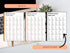 Three identical pages of a book or notebook with text on a desk.