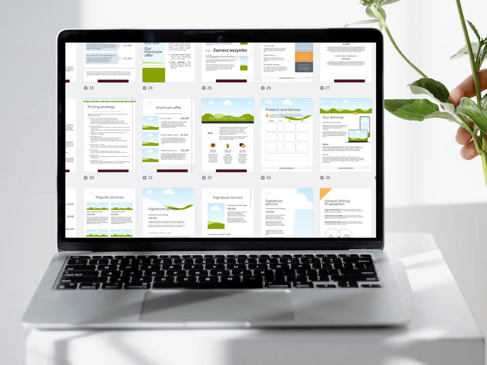 A laptop screen displaying a grid of many colorful business plan pages being edited in a design software