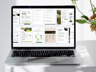 laptop screen displaying a grid view of many different pages from the landscaping template, from mission statements to organizational structures
