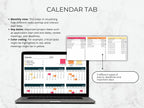 Laptop displaying a calendar with color-coded events on a gray background