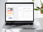 A laptop showing the Canva workspace where the workout tracker table and elements are being adjusted by a user